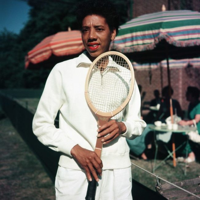 woman with tennis racket